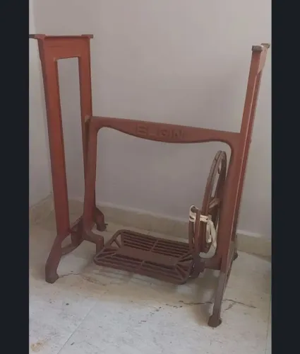 Pé de máquina de costura antigo