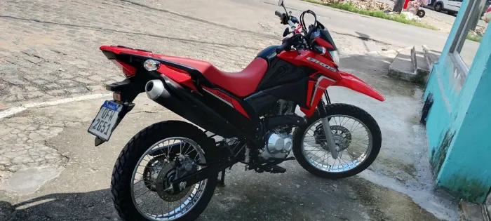 Vendo moto extra valor 21.000 mil