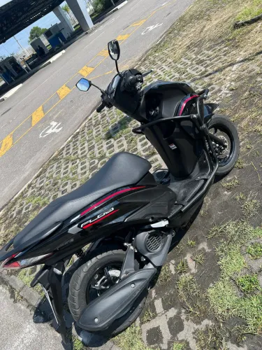 Fluo híbrido ABS com doc ok