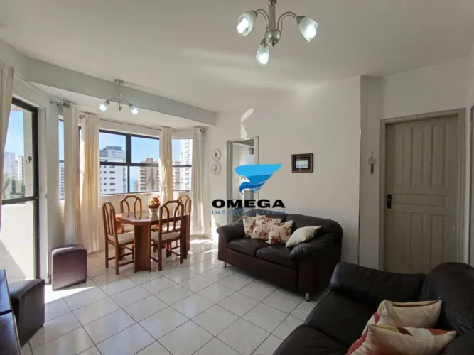 Apartamento à venda na praia daas Asúrias no Guarujá I Omega Imoveis