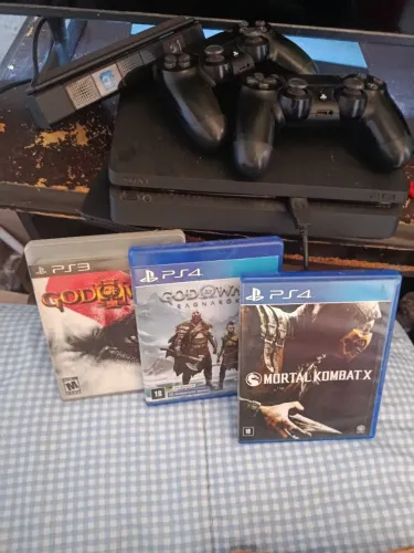 P24, 2 Controles 3 jogos e 1 Câmera.
