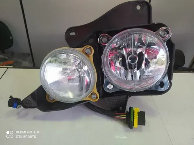 Farol Accelo Mercedes 715 815 915 Novo Original Esquerdo