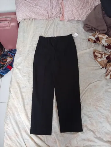 Calça social Riachuelo preta toma