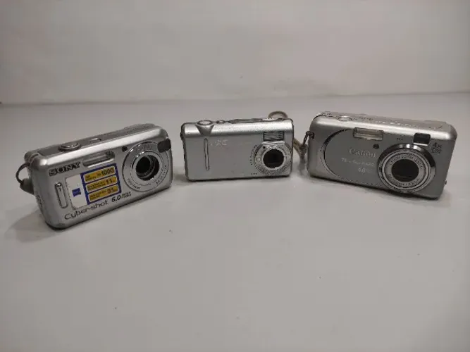 *Defeito LEIA* - Lote 3 Câmeras Digital Sony Canon Dxg 7zn - Prateado (Usado)