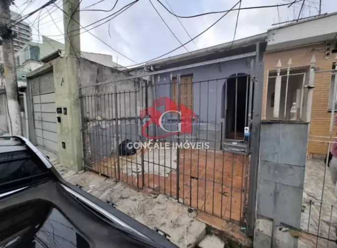 Terreno com casa antiga à venda em Santana