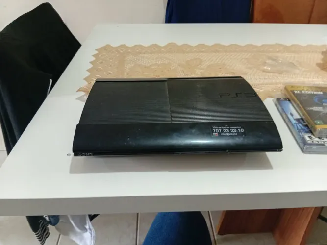PS3 Super Slim + Controle + 2 Jogos | Gran Turismo 5 | R$ 599