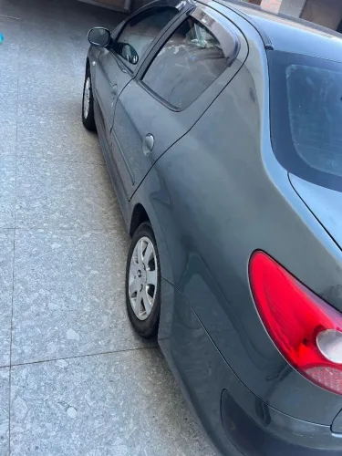 Peugeot 207 Sedan Passion XR 1.4 Flex 8V 4P 2011