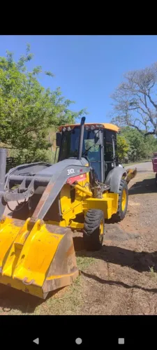 Retro escavadeira Jhon deere 310 L