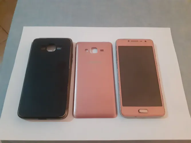Celular Samsung modelo SM-G532MT,com capa de proteção s/ bateria. OBS: Aproveitar peças. 