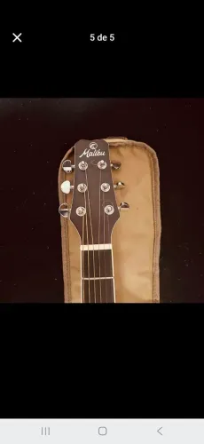 Vendo ou troco violão com efeitos.