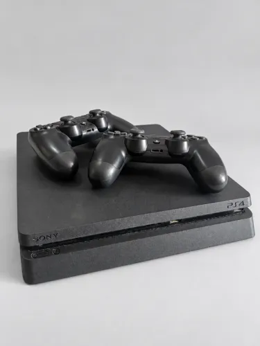 PlayStation slim 1TB - versão mais nova, excelente estado