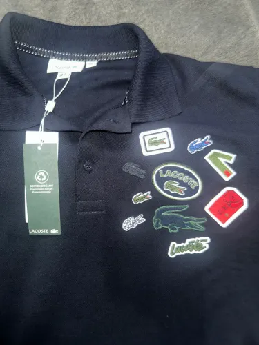Polo Lacoste emblemas Site