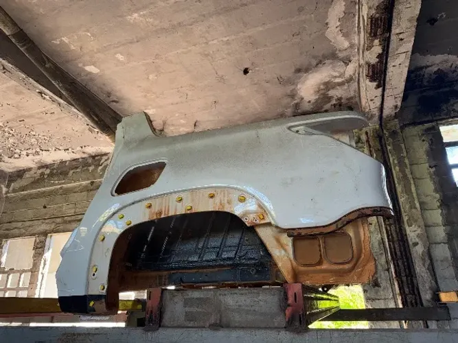 Lateral caixa roda traseira esquerda Fiat Strada 4 portas 2021 2026