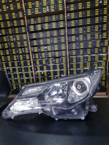 Farol Toyota RAV4 14/16 