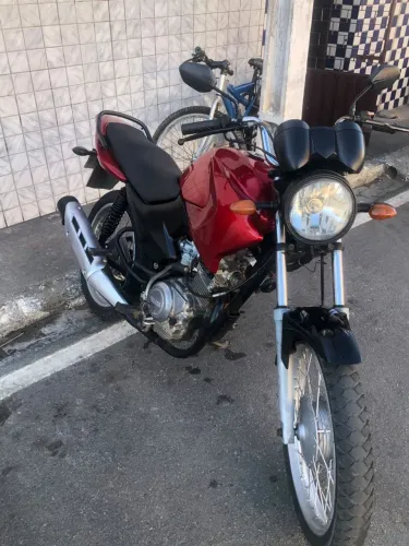 Moto em perfeito estado pneus originais e novos frente nova carburador novo motor feito