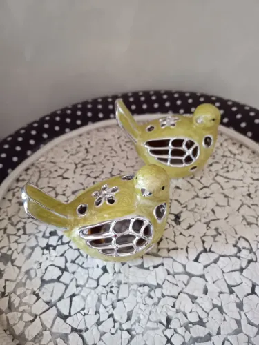 Vendo dupla de pássaros em ceramic candle holder bom years. Ideal para decorar o ambiente.