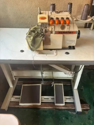 Vendo uma máquina inter lok regulada pouco tempo de uso