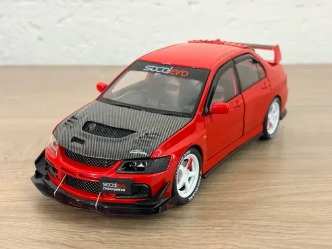 Miniatura Mitsubishi Lancer Evolution IX 1:24 vermelho - som e luz