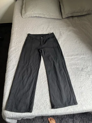 calça jeans wide leg preta cintura baixa