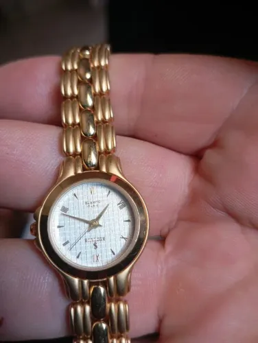 Relógio de pulso dourado feminino Séculos Novo