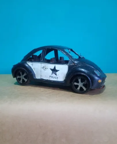 Antiga miniatura Fusca da polícia americana 