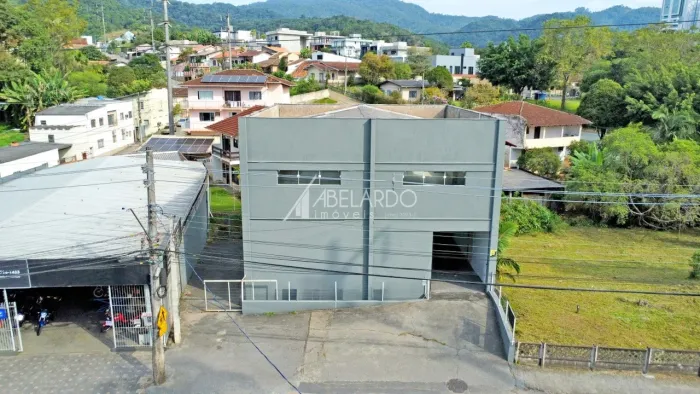 GALPÃO COMERCIAL COM 319,04 M² DE ÁREA CONSTRUÍDA, DOIS PAVIMENTOS, PRÓXIMO À VILA GERMÃNI