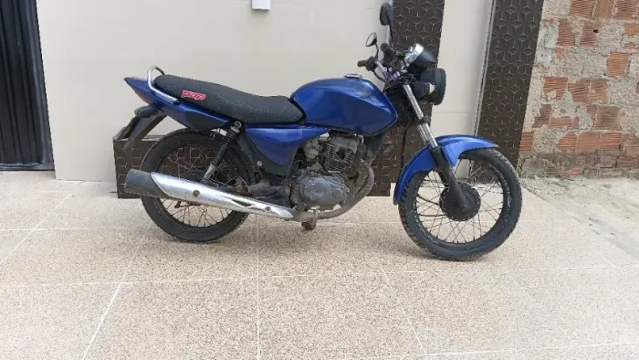 +6                    A Honda CG 150 Titan ES/ESD 2004 é uma clássica moto muito valorizad