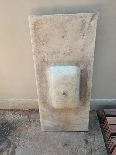 Tijolos baianos e pia de cozinha