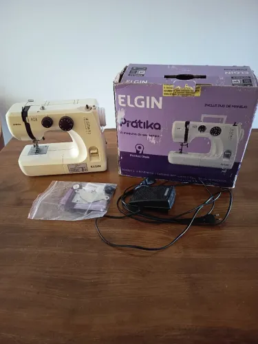 máquina de costura Elgin