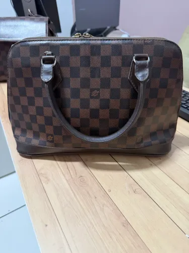 Bolsa tira colo