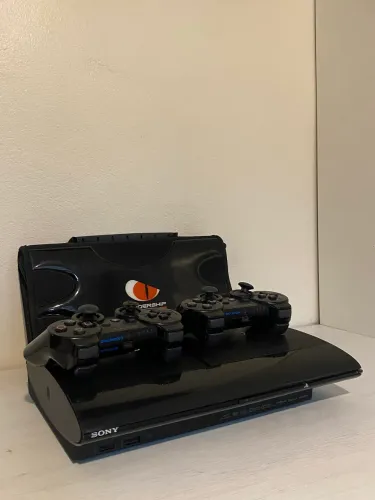 Ps3 Super Slim ,25  jogos físicos, s/ controles.