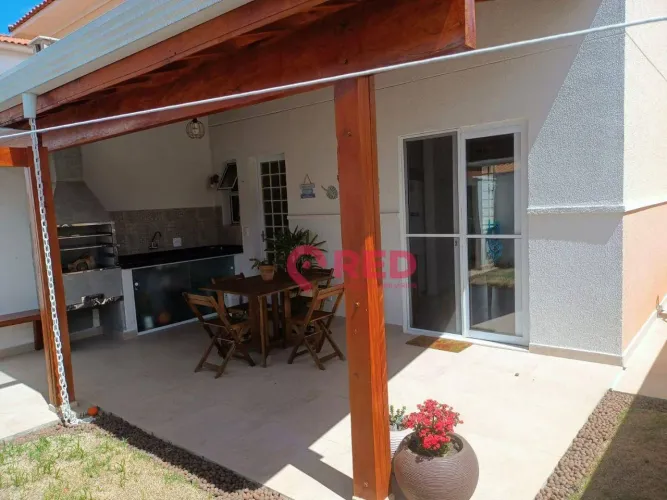 Sobrado com 3 dormitórios à venda, 108 m² por R$ 650.000,00 - Condomínio Villa Flora - Vot
