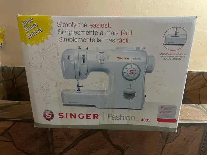 Máquina de costura singer