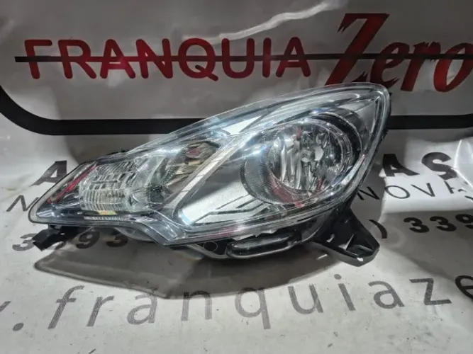 Farol dianteiro esquerdo C3 2013/