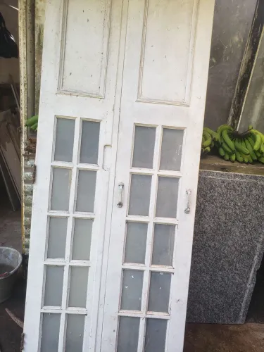 Porta dobrável com vidro