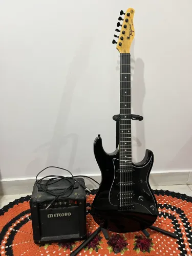 Vende-se guitarra tagima, acompanha cubo de guitarra, suporte e cabos.