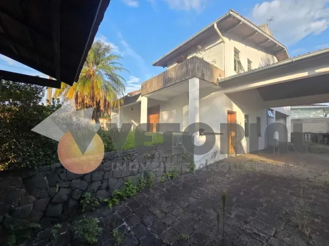 Sobrado com 4 dormitórios para alugar, 350 m² por R$ 6.000,00/ano - Indaiá - Caraguatatuba
