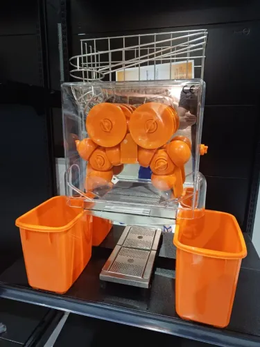 Máquina de suco espremedor automático de laranjas - Marcos