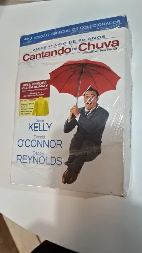 CANTANDO NA CHUVA BLURAY ORIGINAL COM CAPA DE CHUVA LIVRETO E CARDS