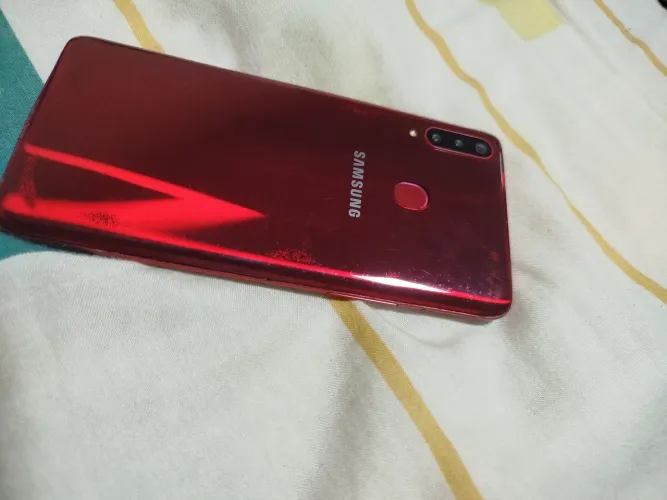 Troco celular em máquina de lavar 