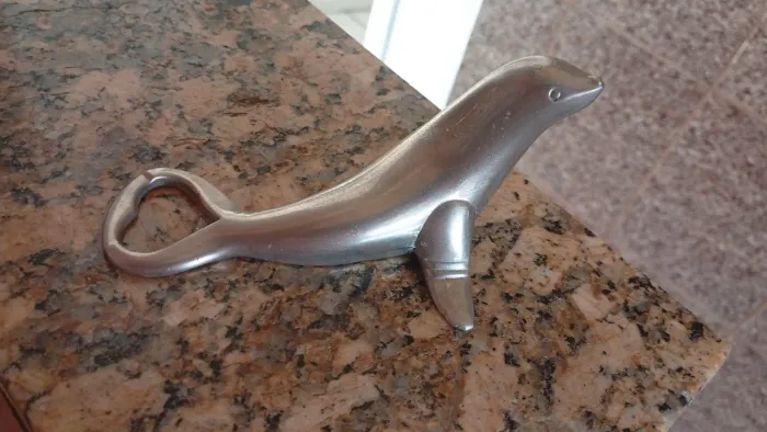 Abridor garrafa em inox foca decoração