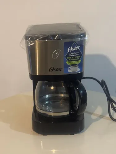 Cafeteira Elétrica Oster Compacta Inox OCAF300 127V 0,7L - Open Box Vitrine Sem Caixa