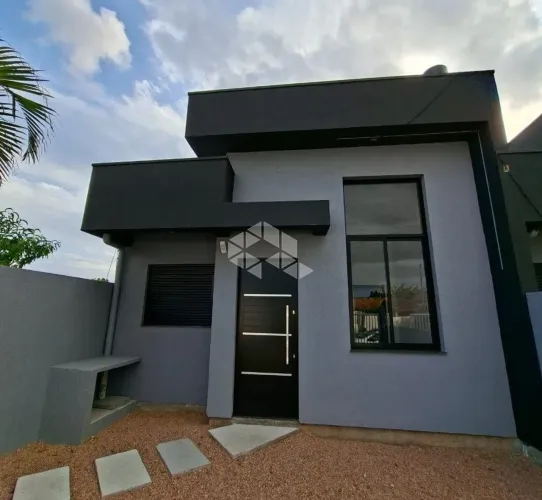 Casa 3 dormitório com suíte, lareira, churrasqueira e 2 vagas em Gravataí.