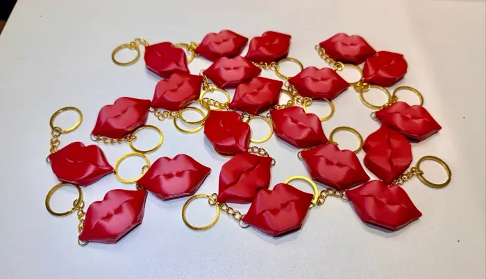 Abridor de lata beijo em 3d