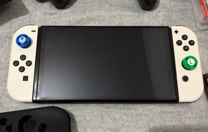 Nintendo Switch OLED 64GB - Estado de Novo + Mega Pacote de Jogos e Acessórios!