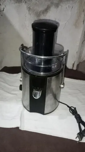 Espremedor de suco elétrico