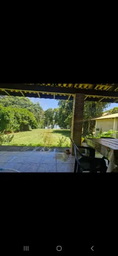 Linda Chacara beira rio