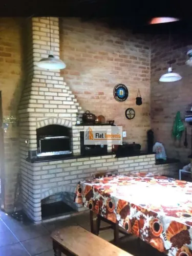 Chácara com 3 dormitórios à venda, 1299 m² por R$ 1.100.000,00 - Condomínio Portal dos Ipê