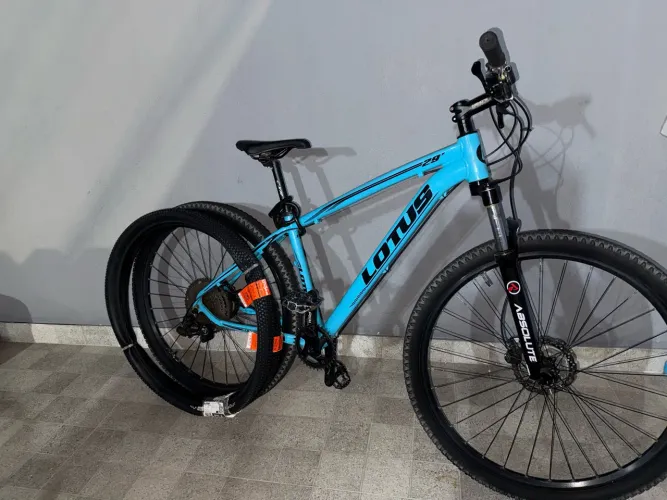 Vendo bicicleta lotus com suspensão absolute com câmbio 12 velocidades