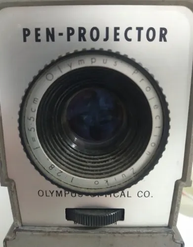 Projetor Olympus Pen Projector 1:2.8 f=5.5cm - Não testado